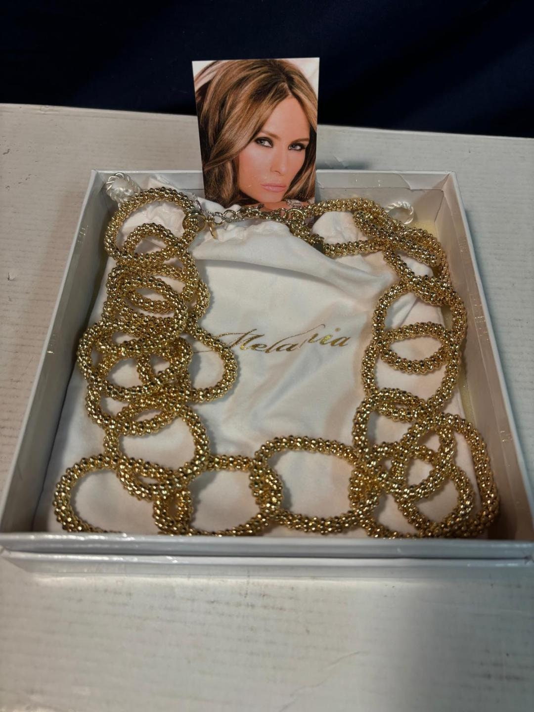 Melania Trump necklace gold: Discover stunning designs and find your perfect golden piece!