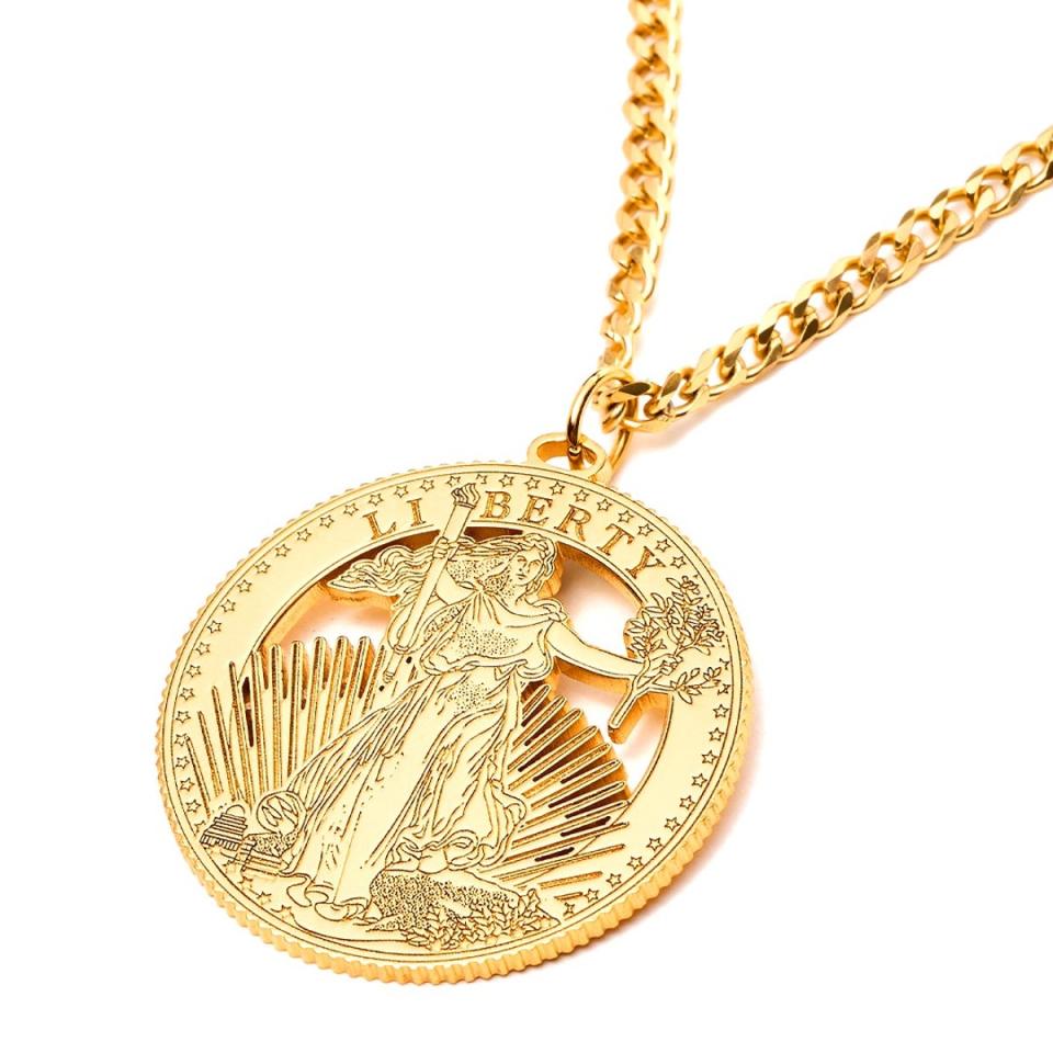 Melania Trump necklace gold: Discover stunning designs and find your perfect golden piece!