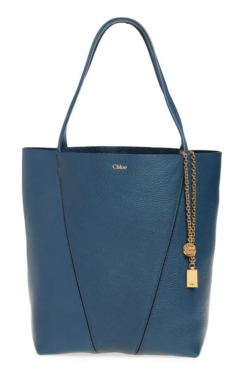 Shop Blue Designer Bags: Chic and Affordable Options Here.