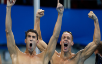 Why does Caeleb Dressel wear that arm sleeve in the pool? We explore the reasons behind this choice for elite swimmers during major races.