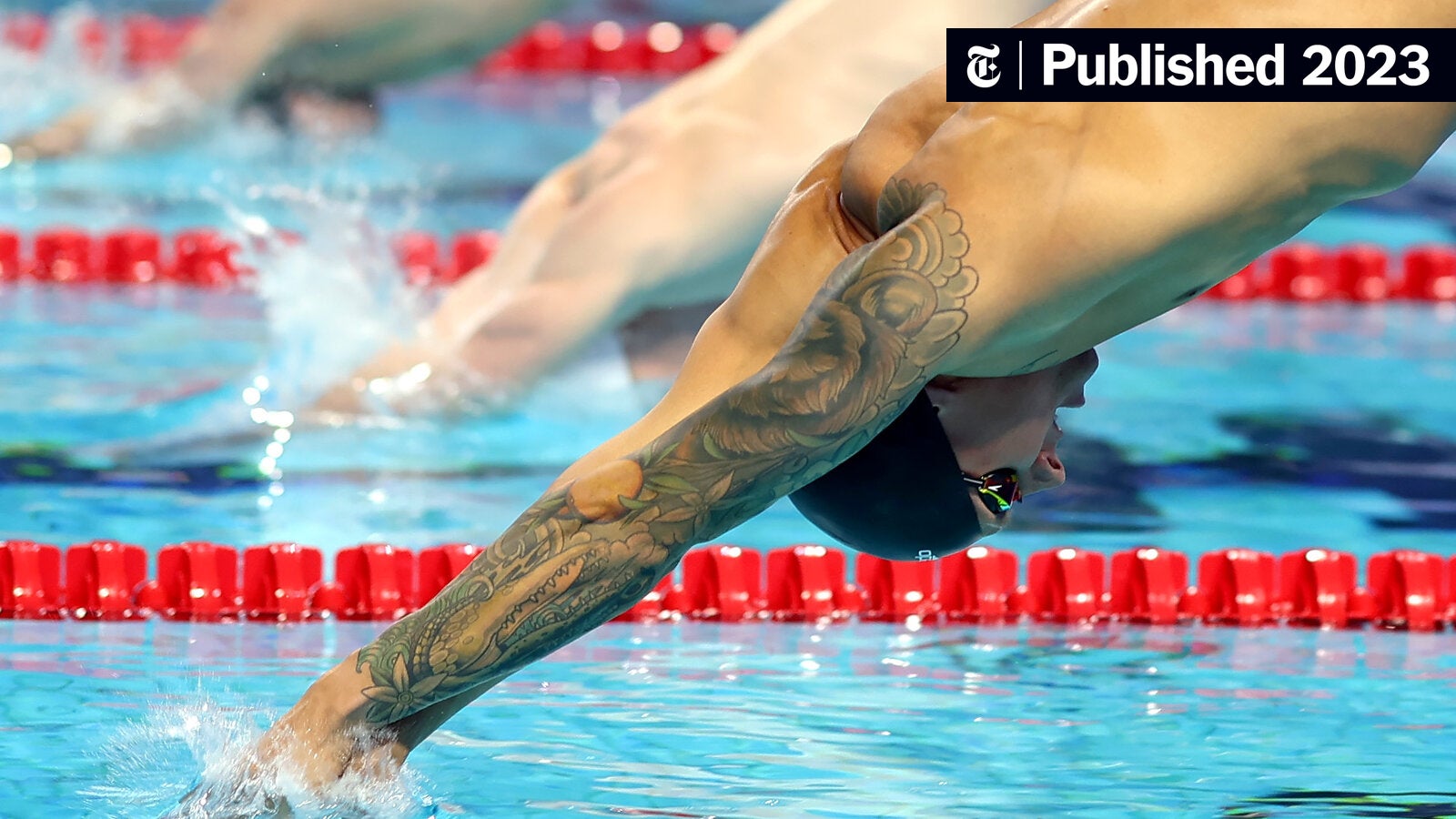 Why does Caeleb Dressel wear that arm sleeve in the pool? We explore the reasons behind this choice for elite swimmers during major races.