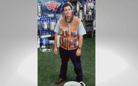 Why does Adam Sandler wear a suit sometimes? Unpacking the rare formal looks of the comedy king.