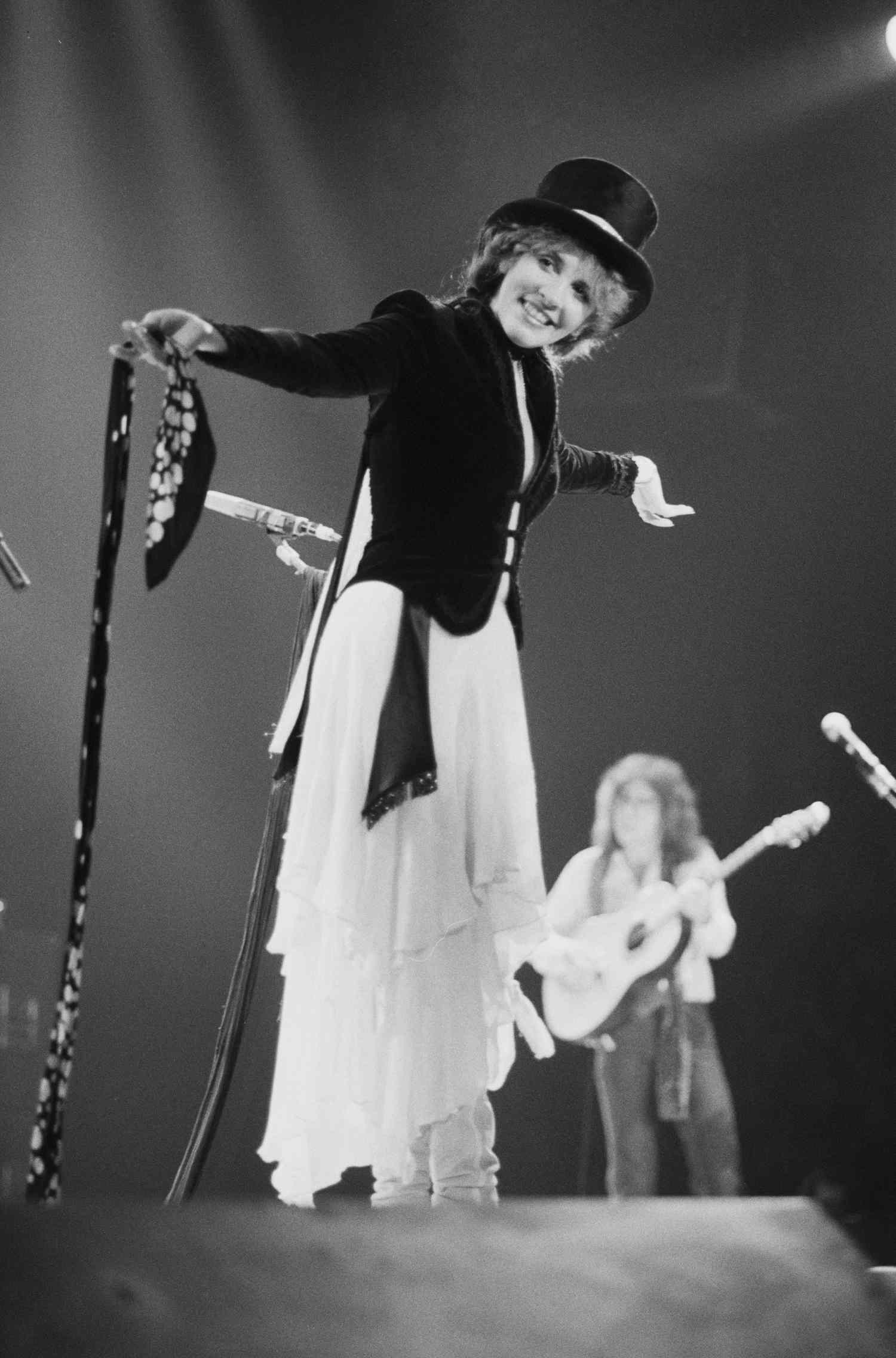 What are the most iconic Stevie Nicks outfits? See photos of her unforgettable stage looks.