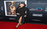 Is Selena Gomez pregnant in that red dress? We investigate the rumors surrounding her stunning look.