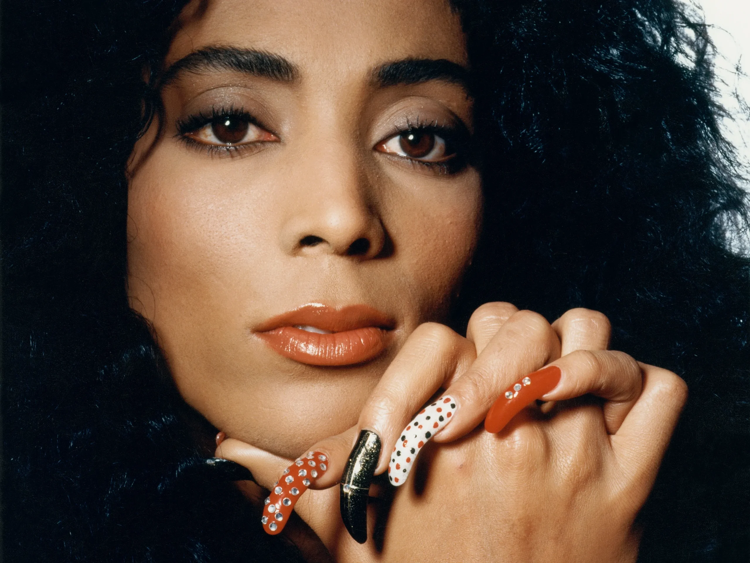 Need ideas from Flo-Jo nails images? See her boldest track star manicures for your style!