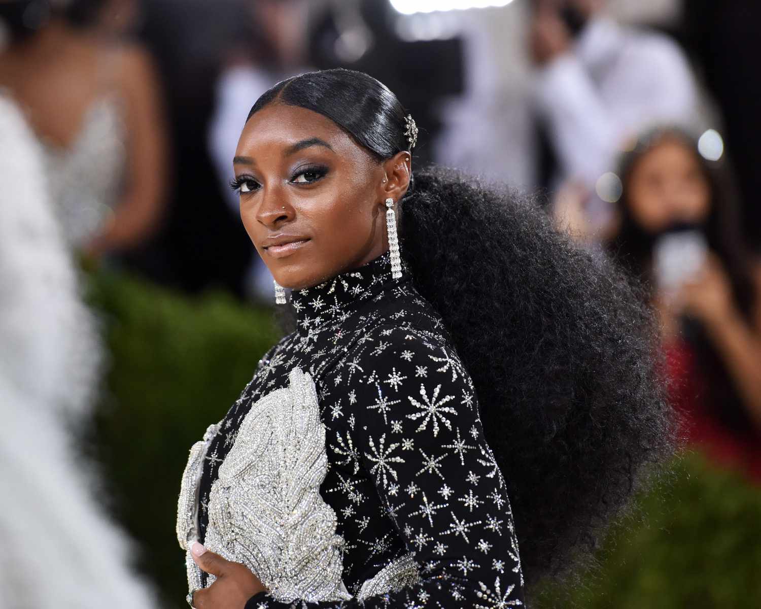 What are the best Simone Biles red carpet looks? See all her amazing Simone Biles red carpet outfits!
