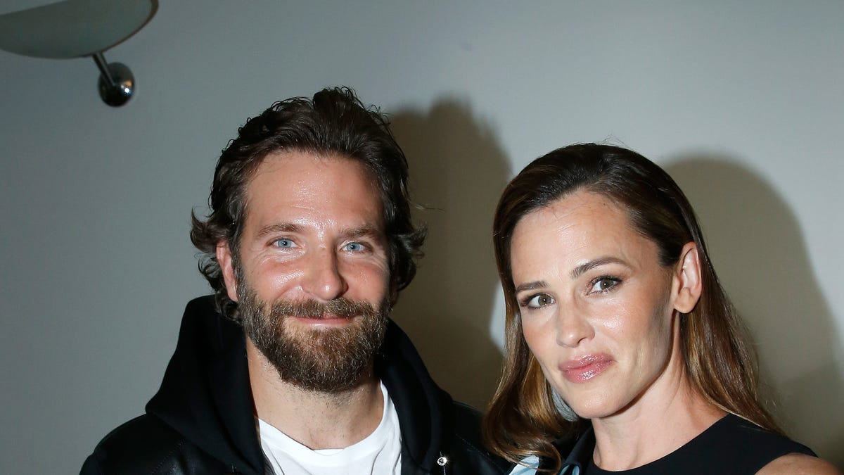 Are Bradley Cooper and Jennifer Garner more than just good friends? Digging into the relationship rumors after their cozy beach day photos surfaced.