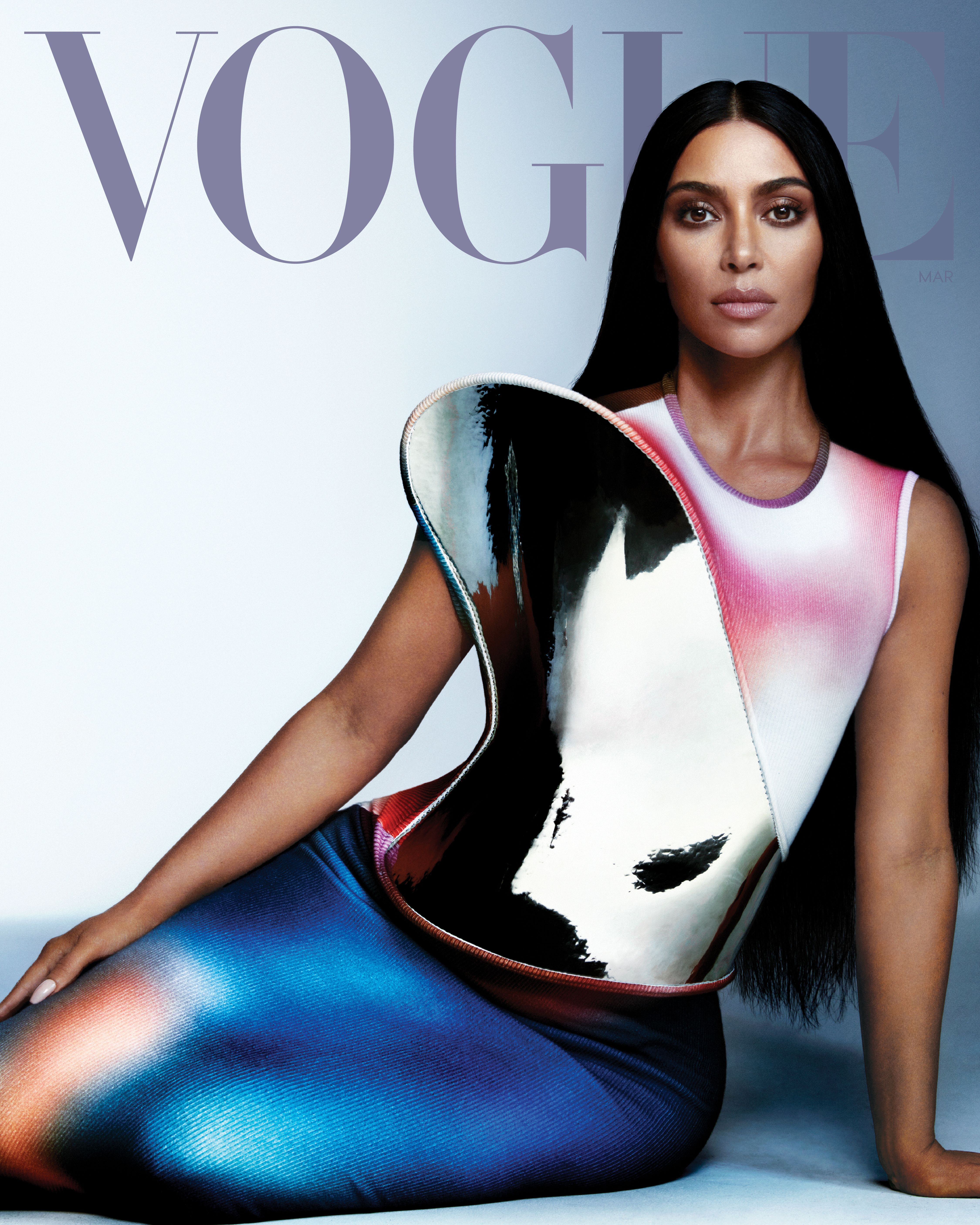 kim kardashian on the cover of vogue the hot debate this photo started