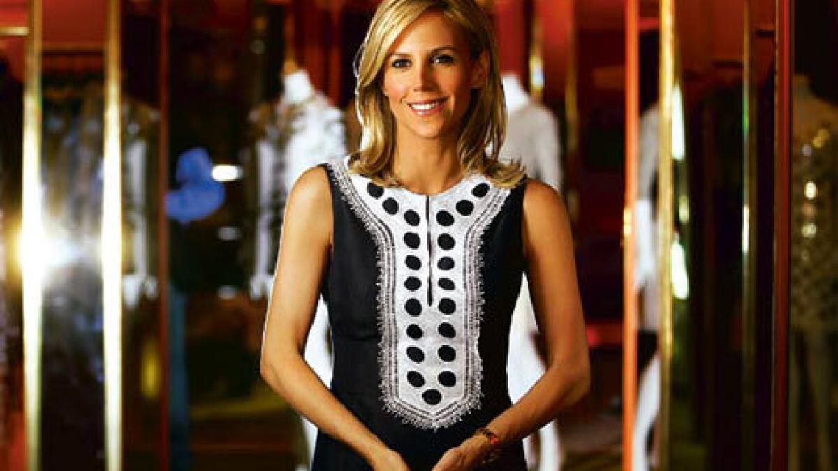 What Makes Tory Burch Outfit Photos Special? Find Her Signature Style Secrets.